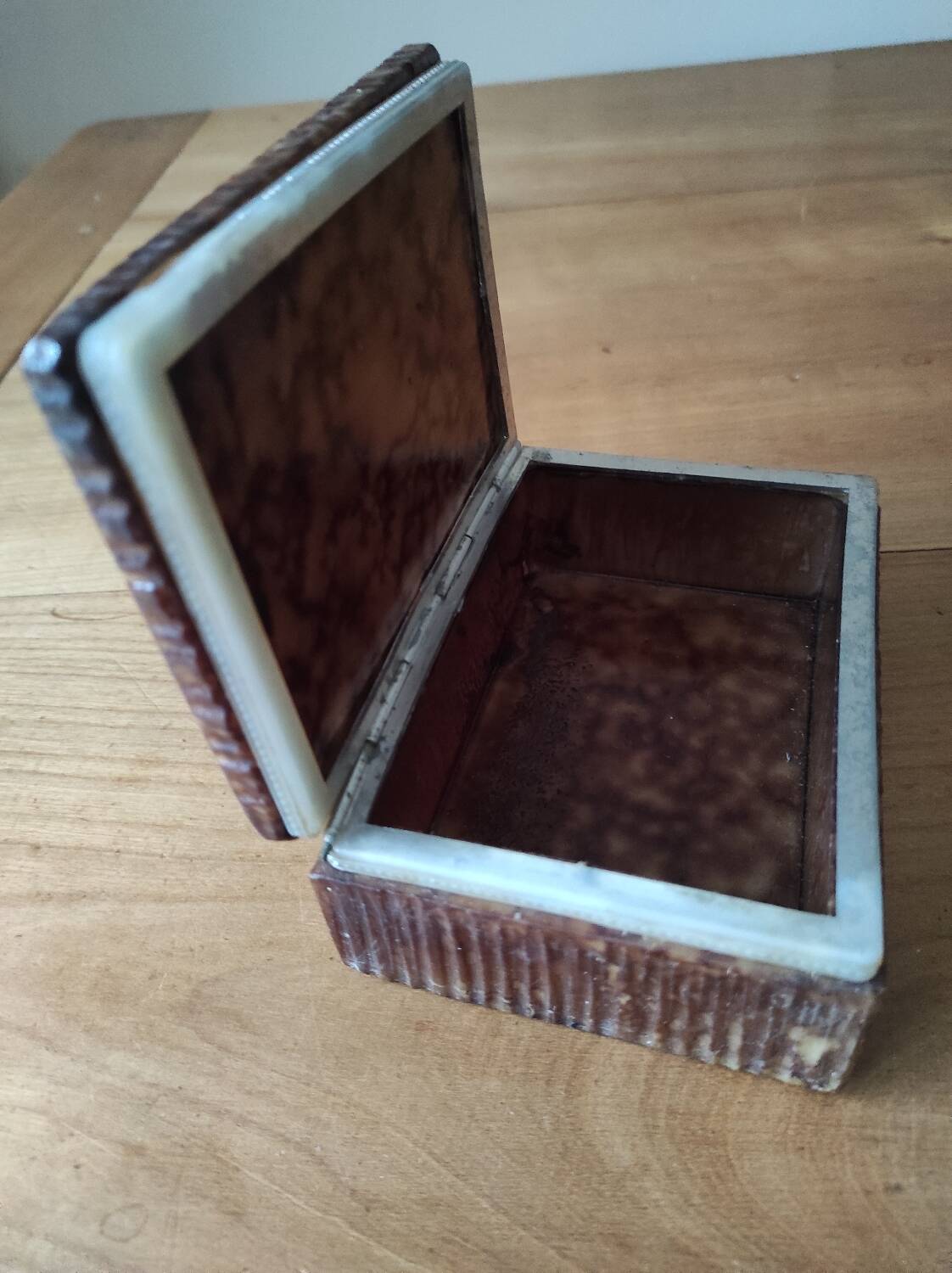 Tobacco set including a vintage stone ashtray.