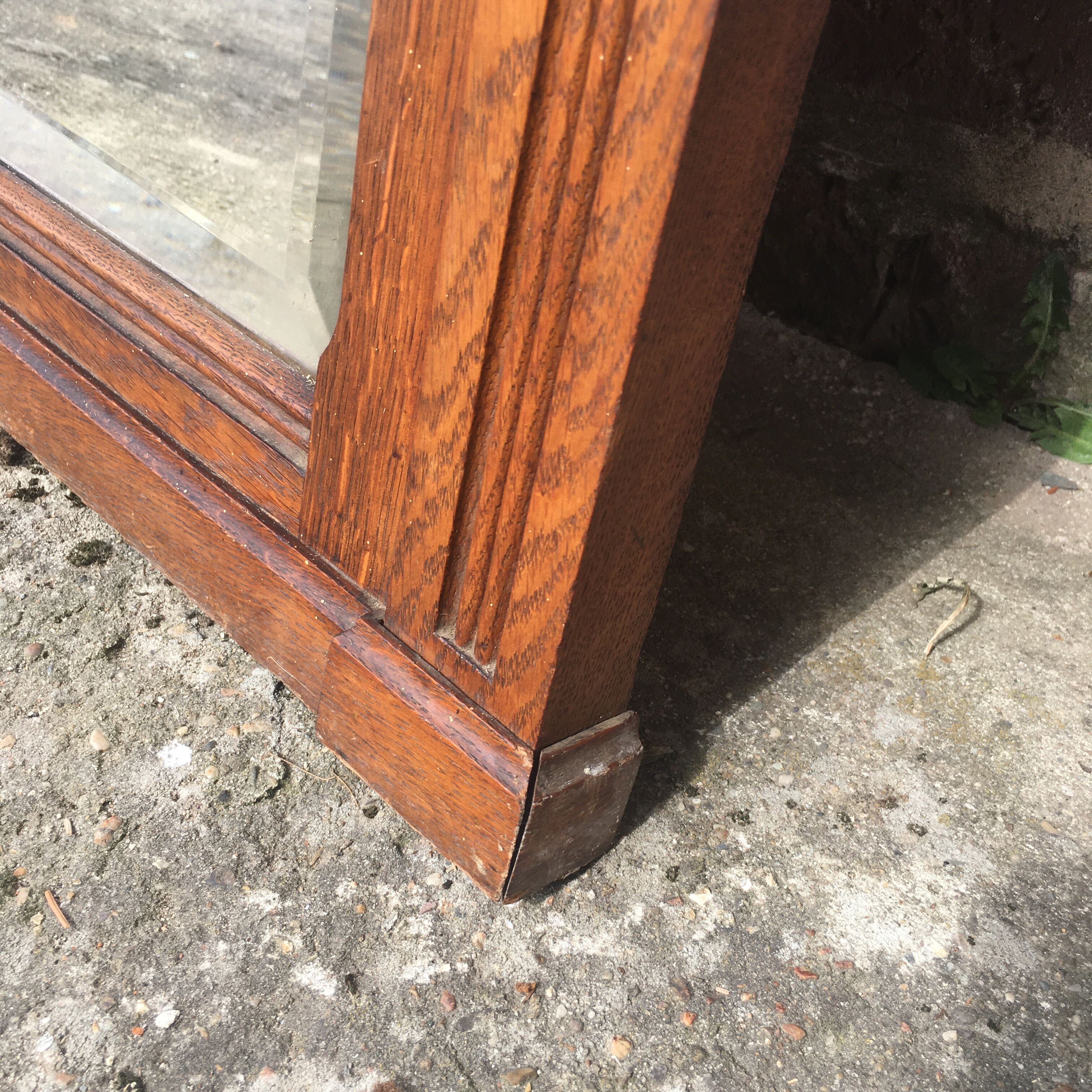 Beveled fireplace mirror