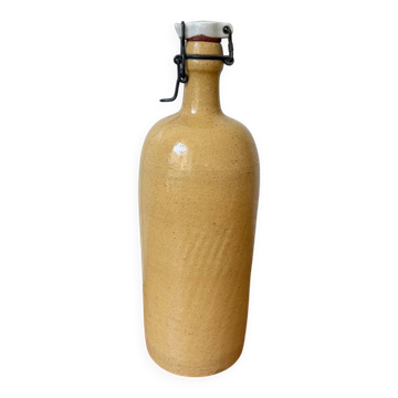 Vintage yellow stoneware bottle