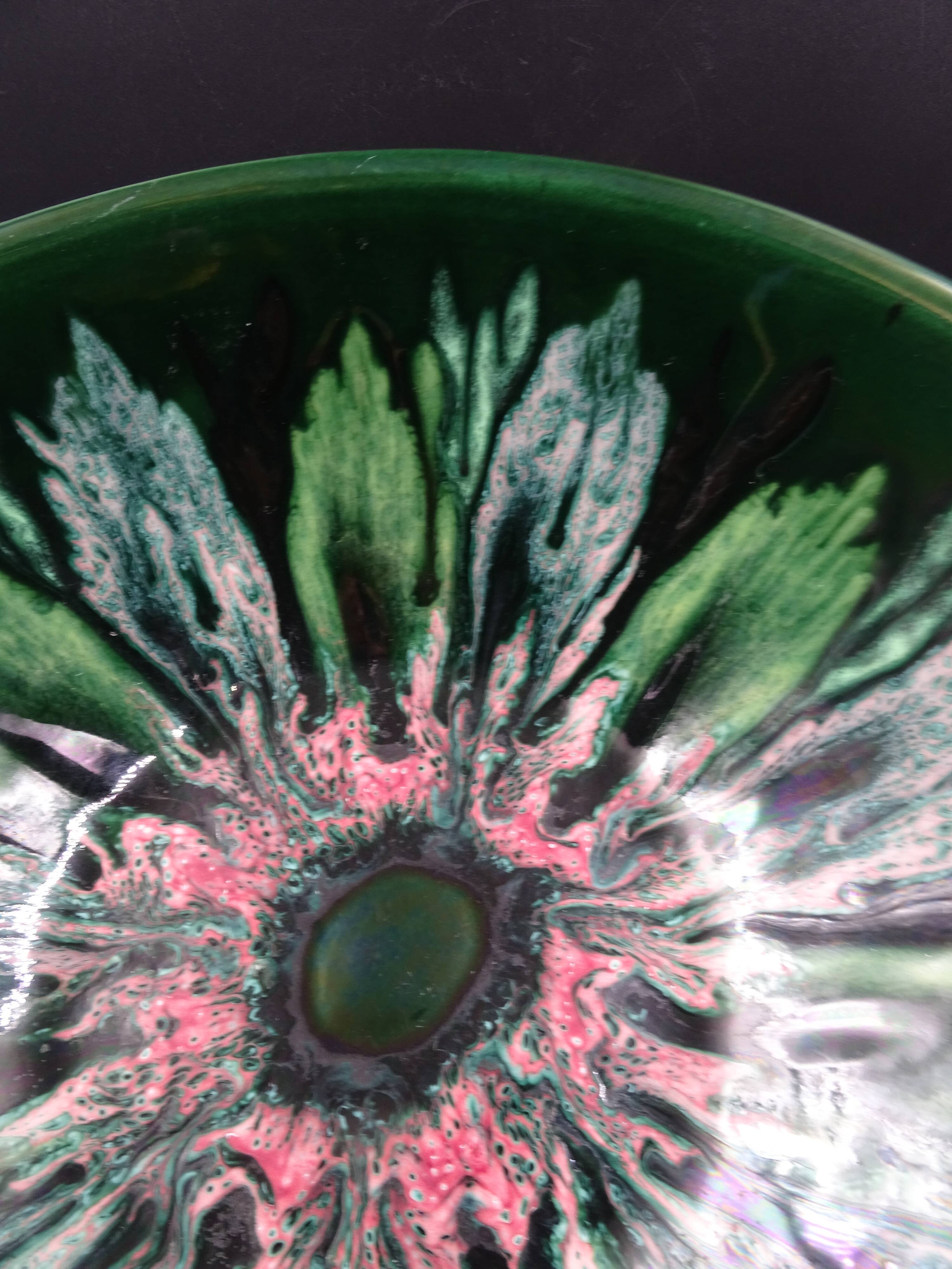 Green faience bowl decorated with multicolored drips around 1970