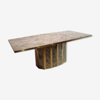 Marble and brass dining table with marble inlay surface