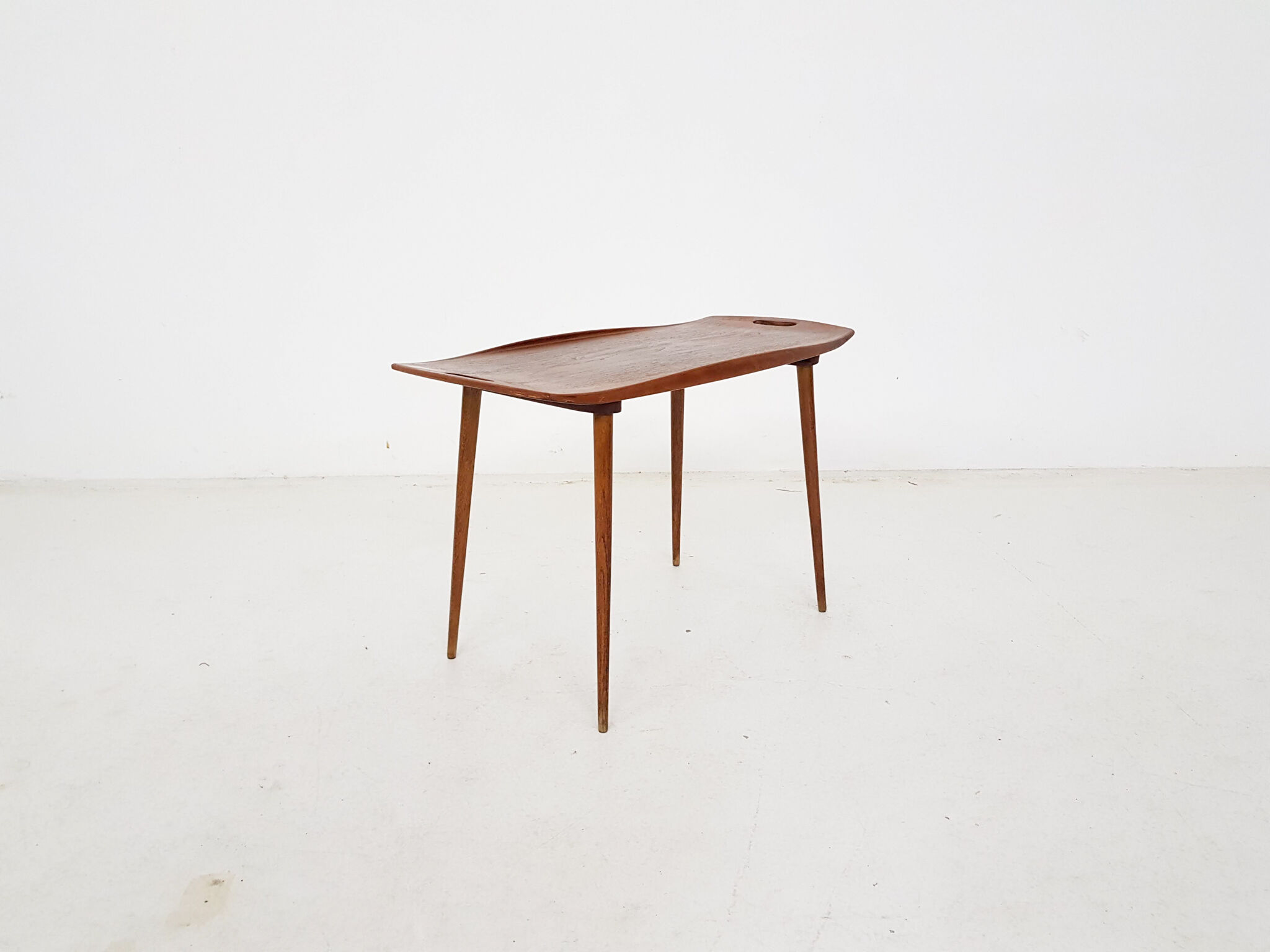 Teak side table with handles by Jens Quistgaard