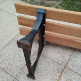 Garden bench with old cast iron legs