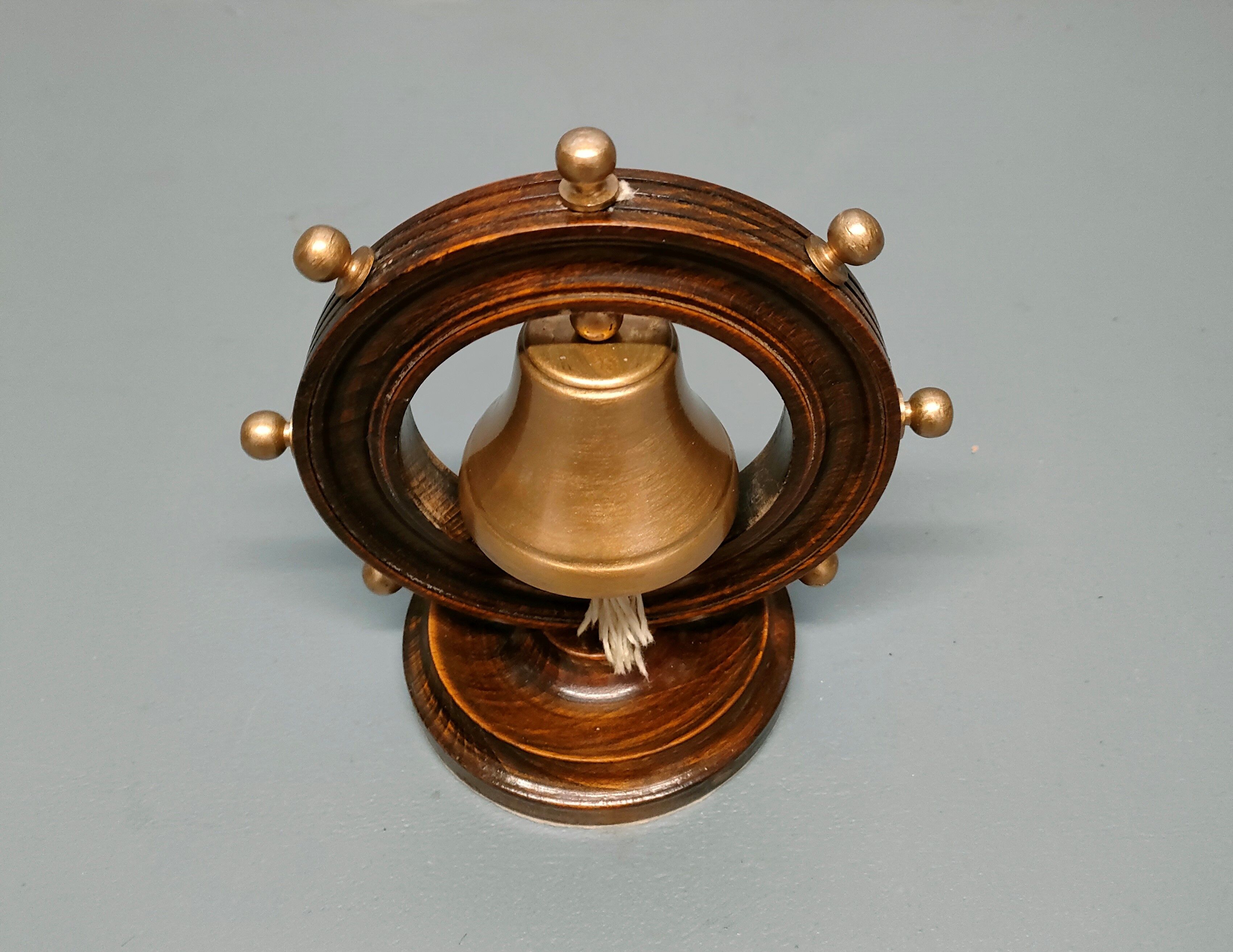 Ship's bell mounted on bar 1950s 60s