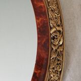 Modern oval mirror with flower decoration