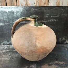 Large old jug cooked buried