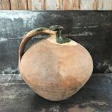 Large old jug cooked buried