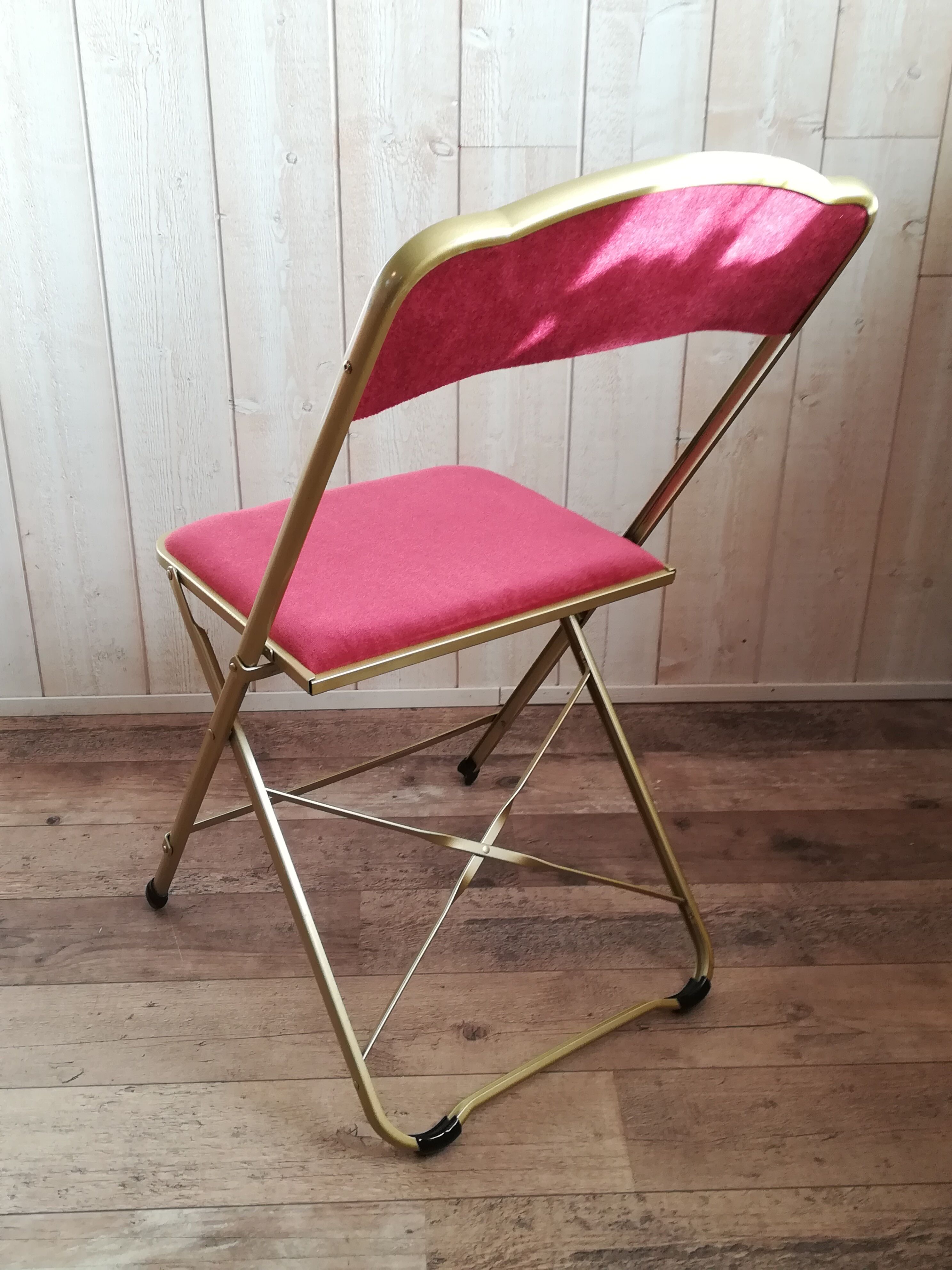 Pink velvet folding chair