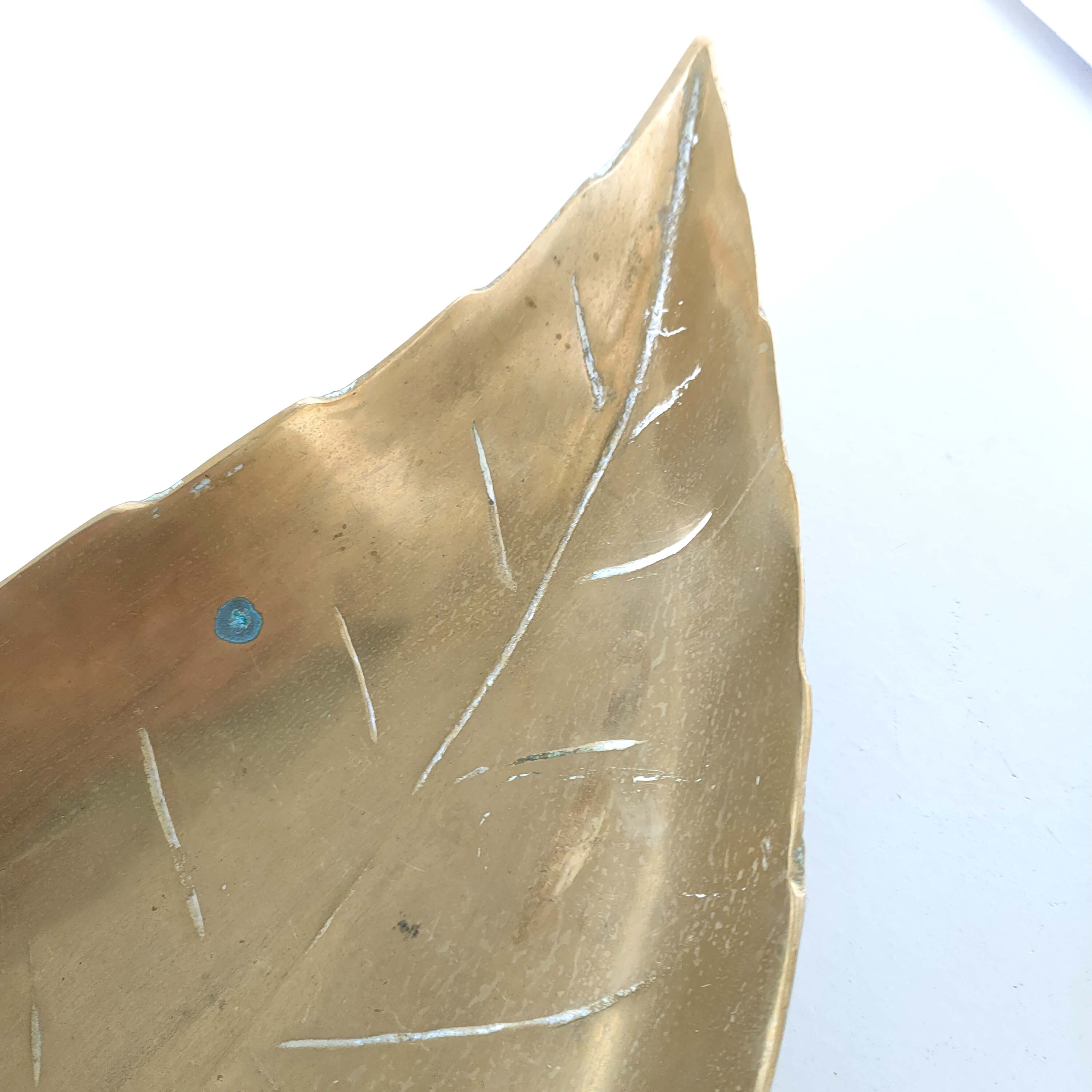 Empty brass leaf pocket