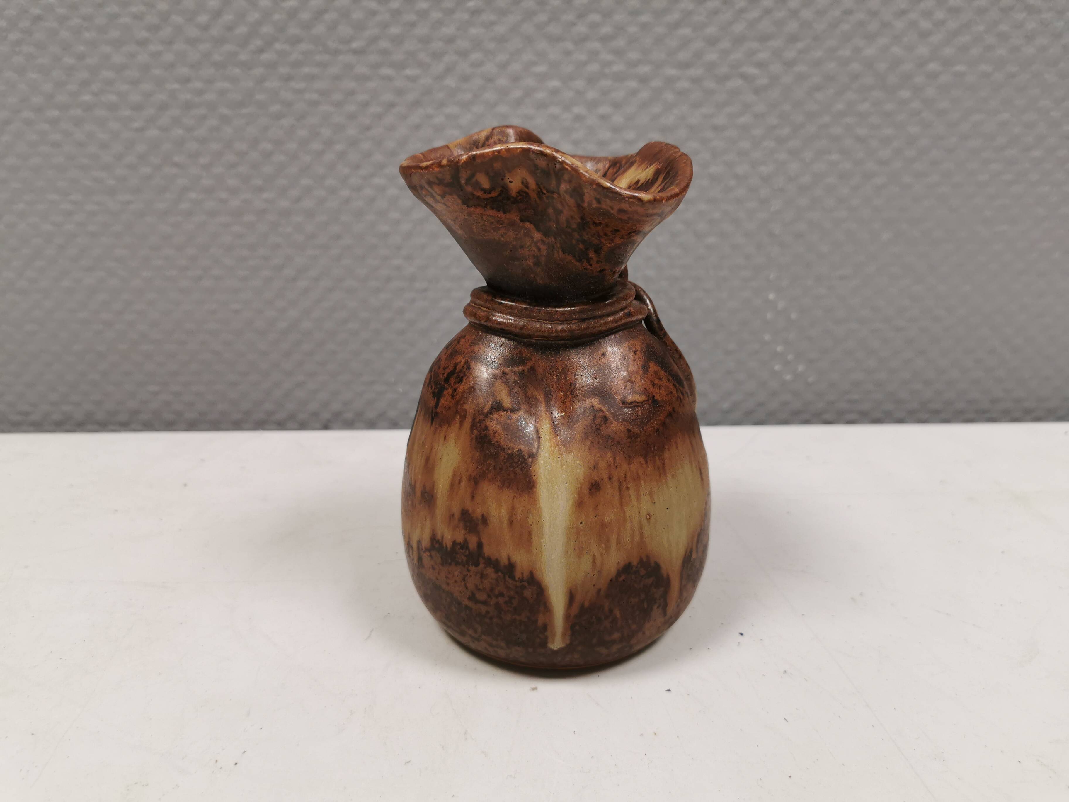 vase shaped like a money bag, in beautiful earthy colours.