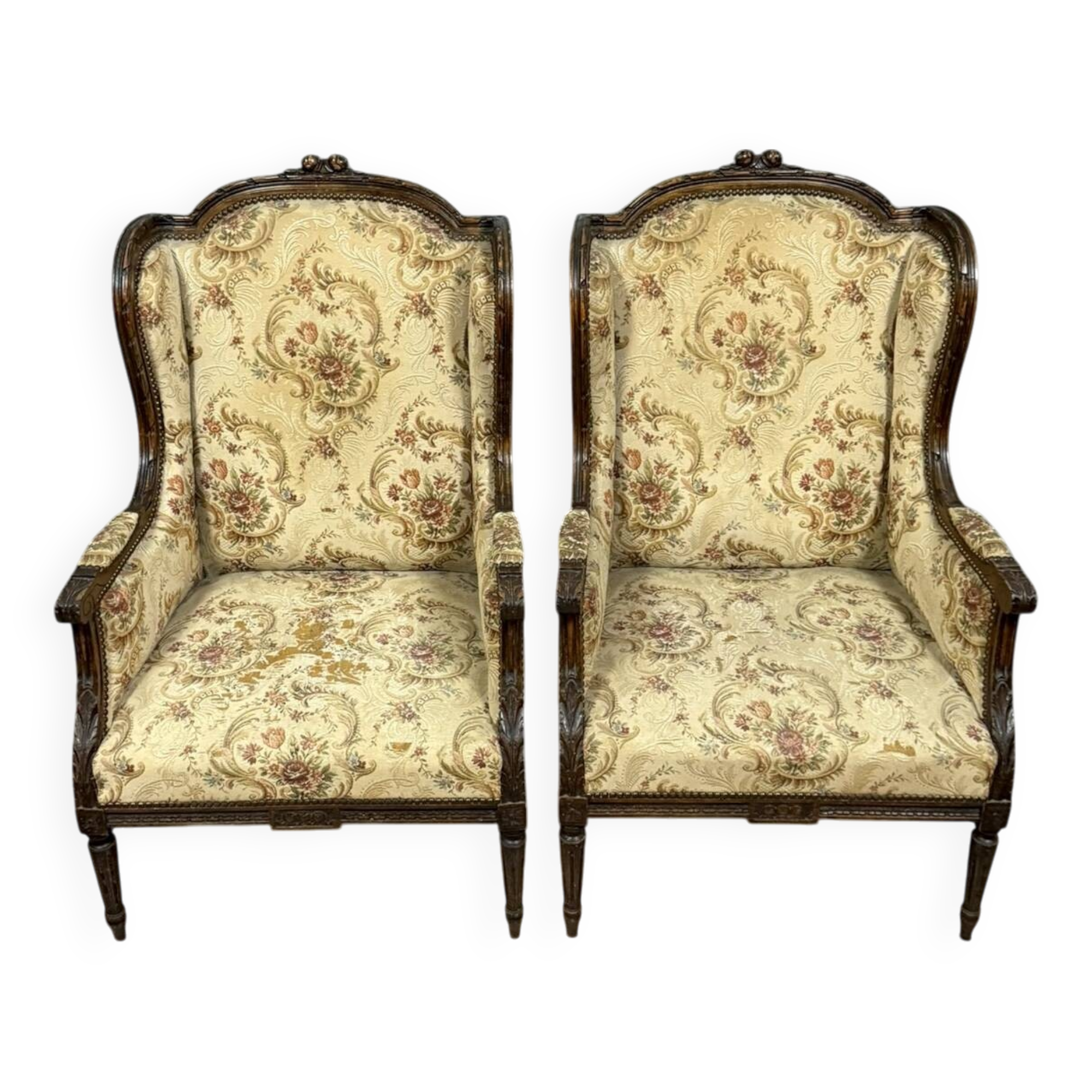 Large pair of Louis XVI style carved wooden wingback armchairs