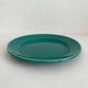 Plat rond en faïence vert vintage