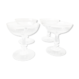 4 glasses of carved crystal champagne