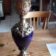 Pair of golden regulated ewers and blue glass