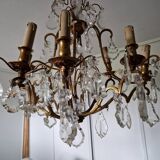 Lustre ancien à 8 bras de lumière à pampilles en bronze et cristal
