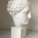 Greek Ap Hygie head. Scopas Hellenistic Greek art in plaster-bleached terracotta