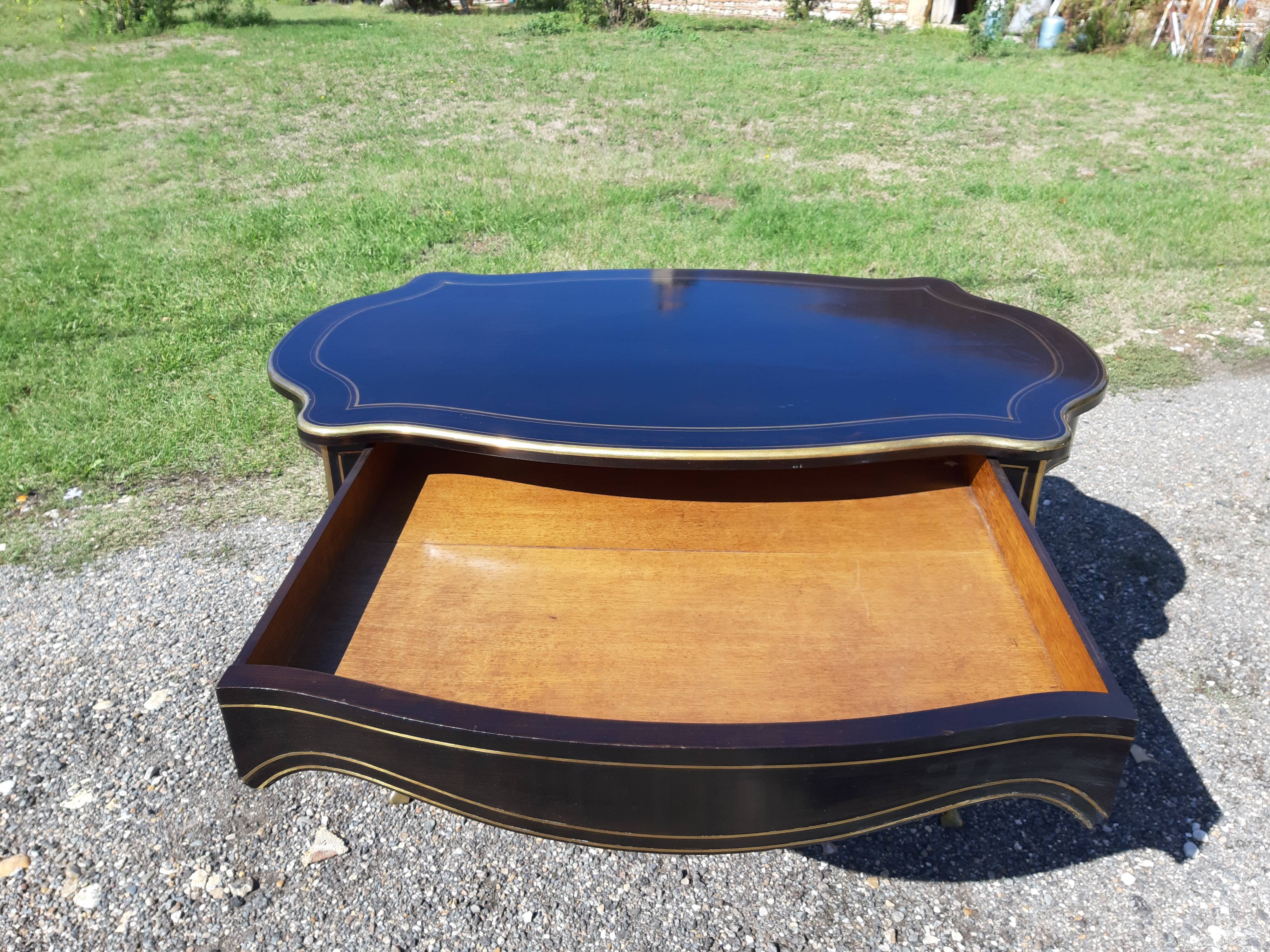 Napoleon III black lacquered wood and brass table