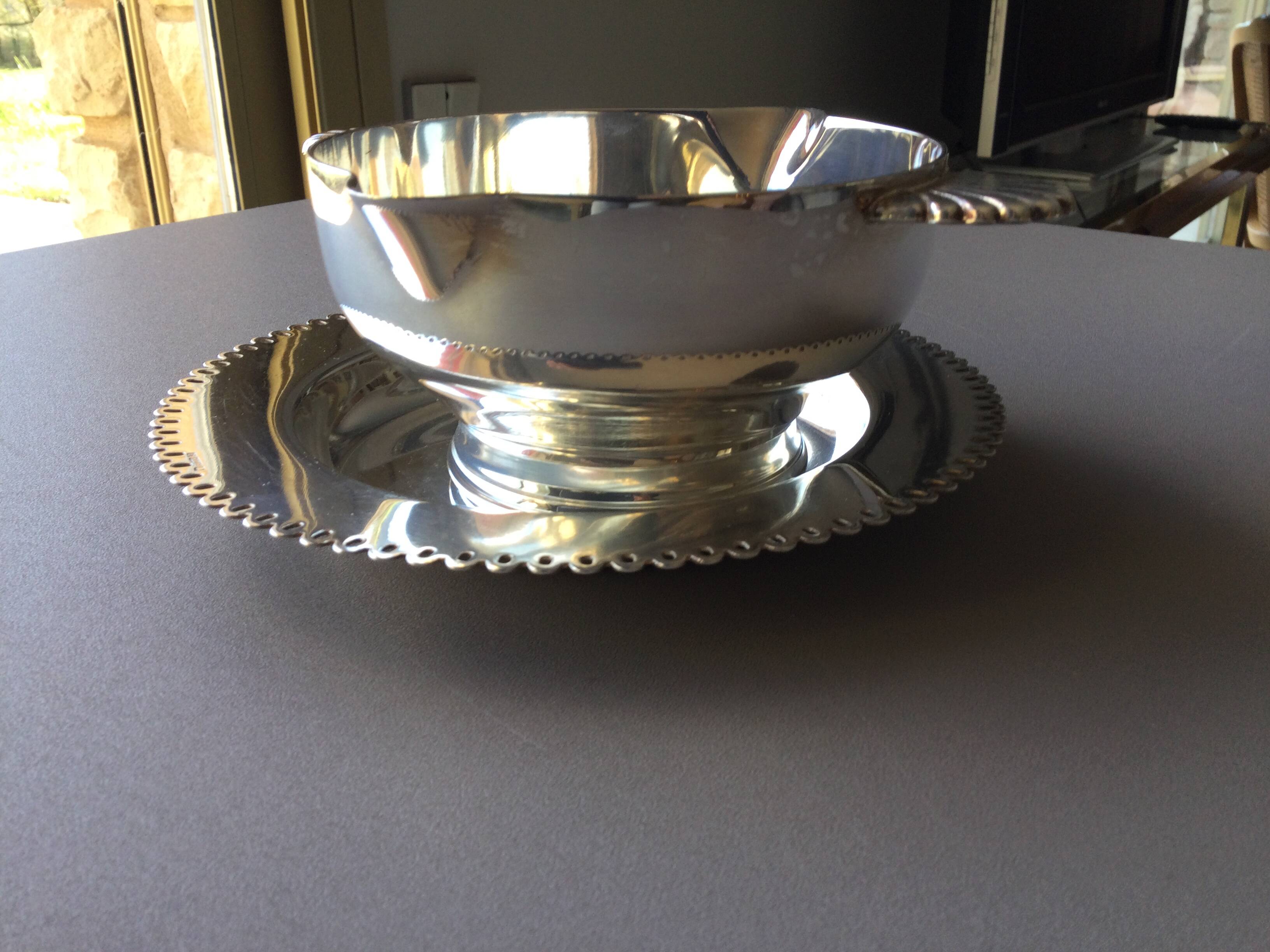 silver-plated metal sauce boat