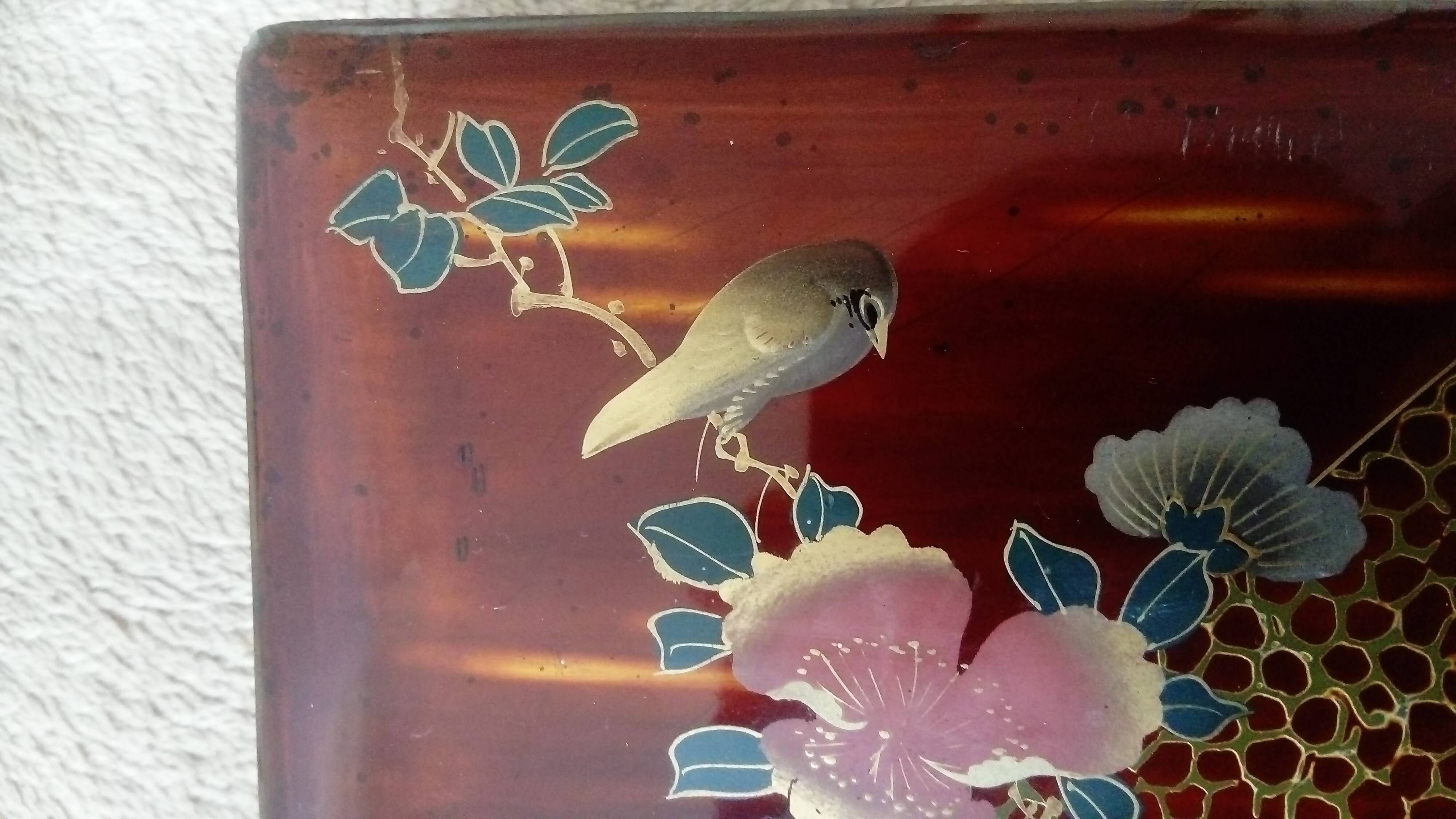 Old lacquered jewelry box with Asian decoration bird, flower, bee