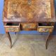 Louis XV slant-top desk in 18th-century marquetry.
