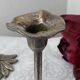 Pair of metal flower candlesticks