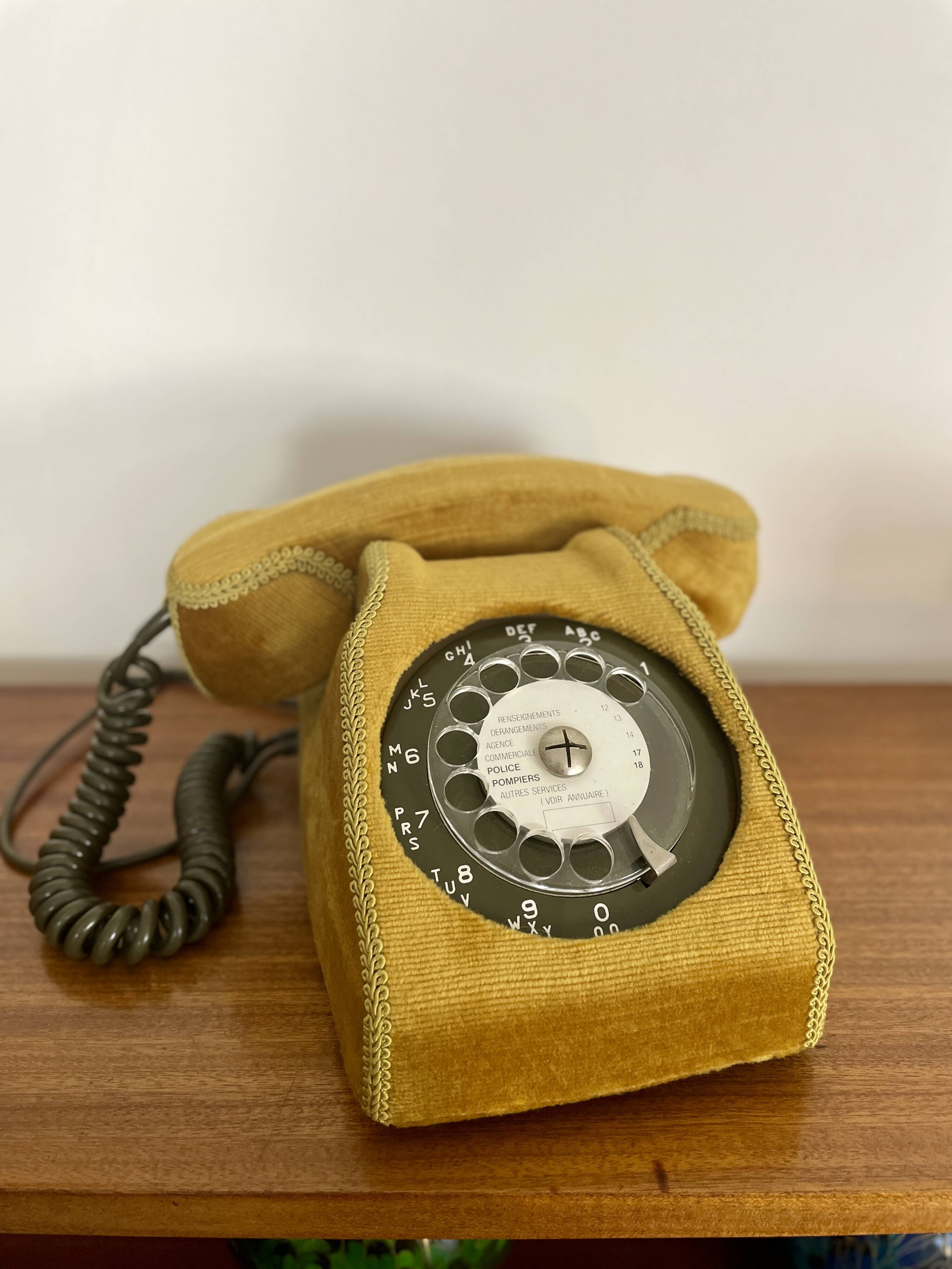 Socotel S63 telephone with its gold velvet shell