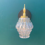 Gilded brass wall lamp and its colorful thick glass tulip