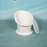 Space-age shell chair with storage, Ikea Popptorp chair.