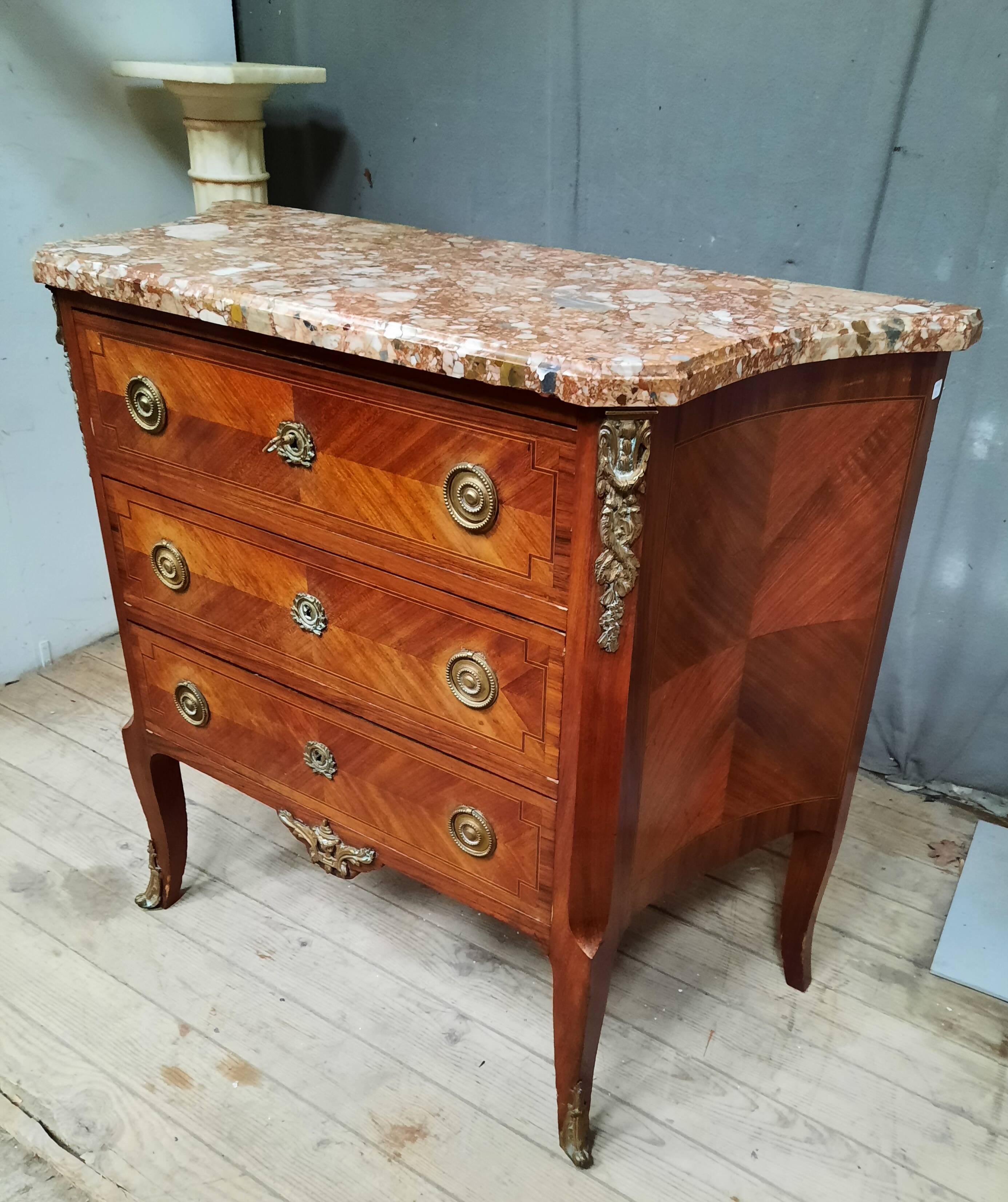 Transitional marquetry chest of drawers