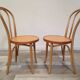 Pair of curved wooden bistro chairs