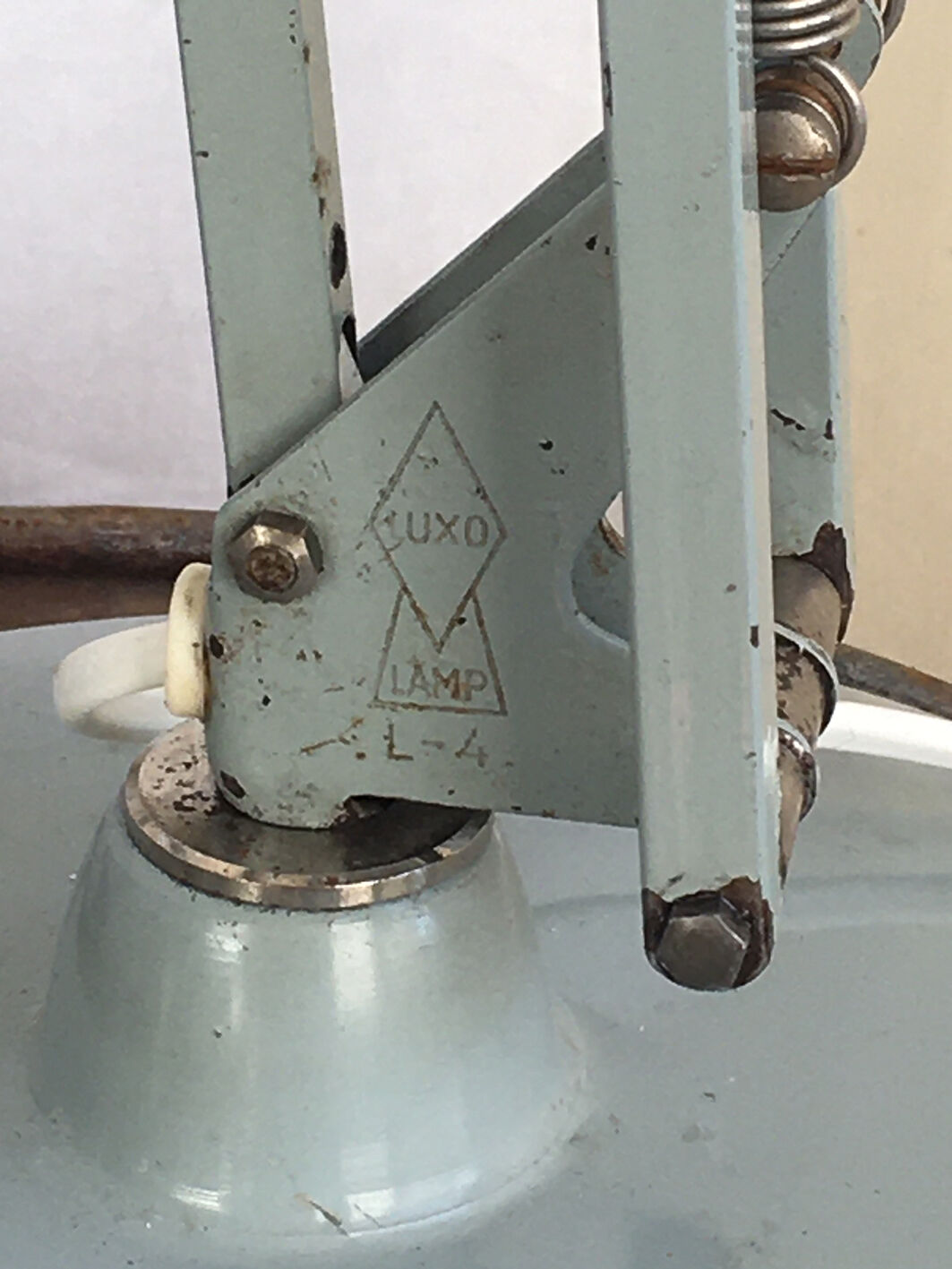 Three articulated lamps on Luxo base