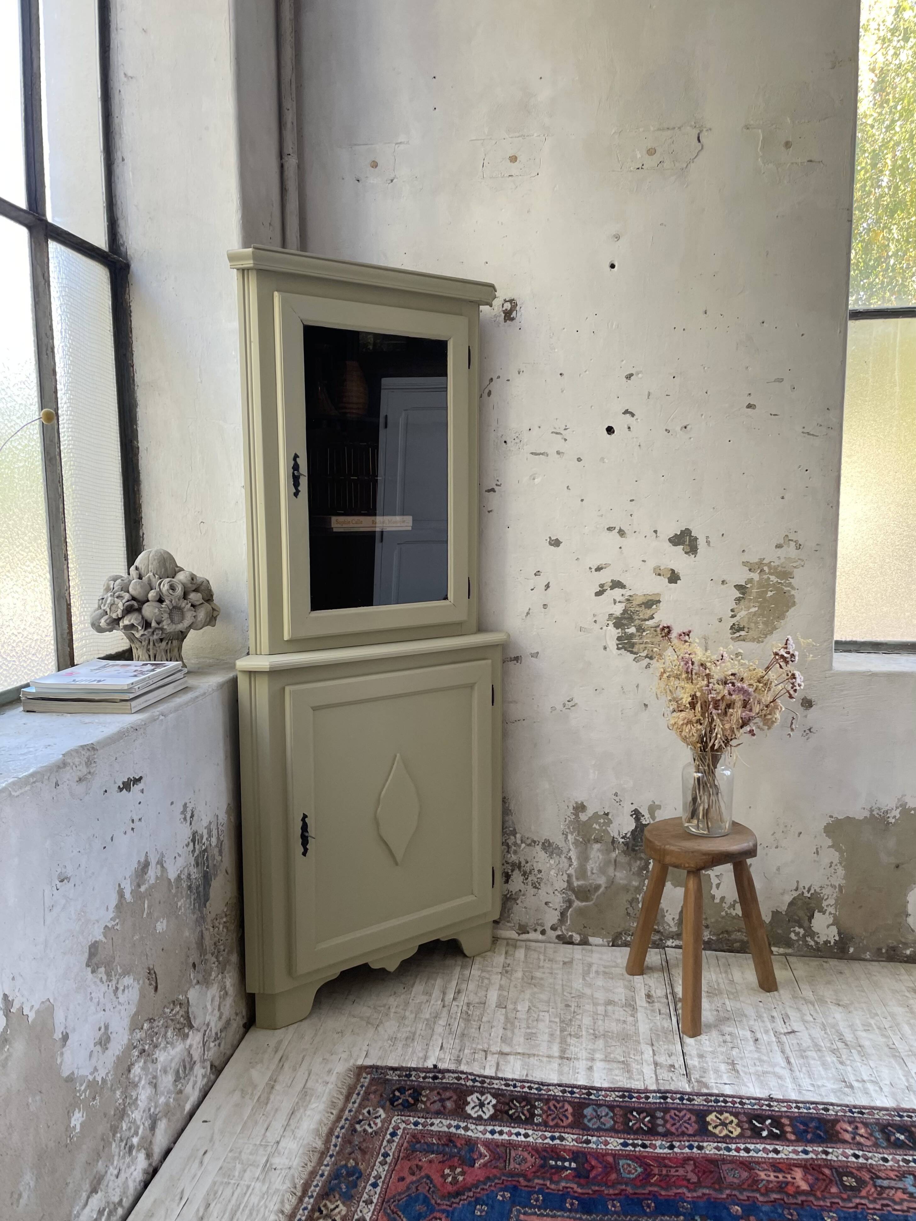 Corner display cabinet from the 1950s