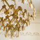 Vintage chandelier in gilded brass with crystal pendants.