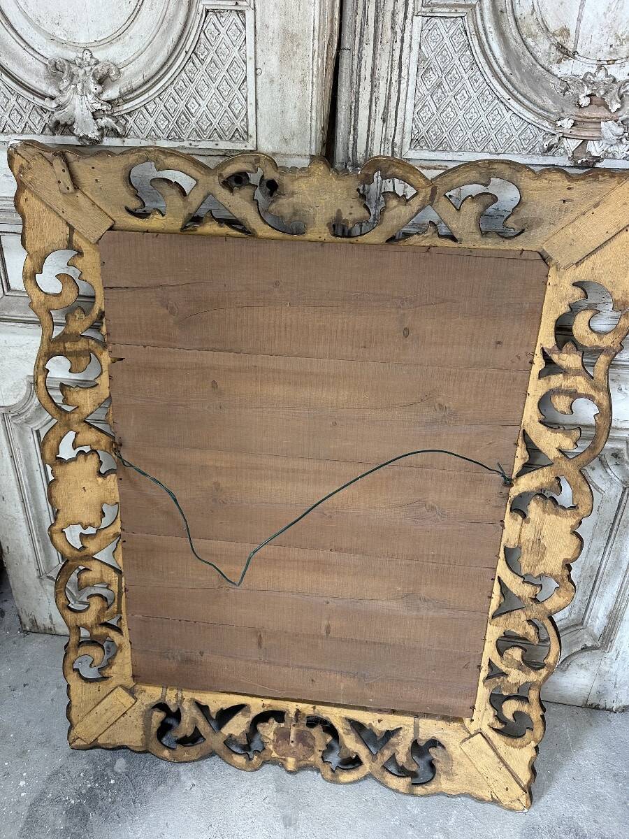 Miroir en bois sculpté doré XIXe siècle