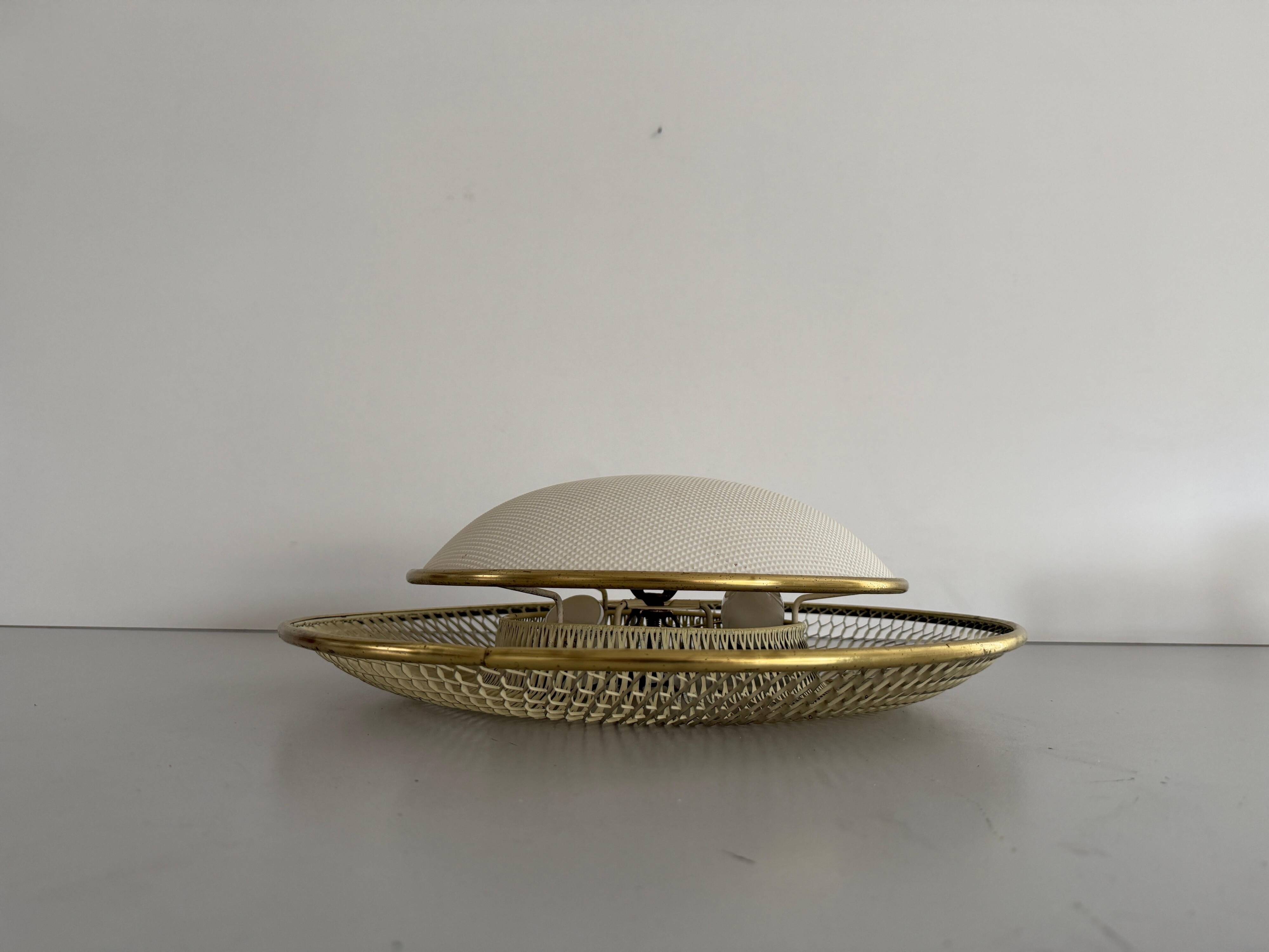 Mid-century golden metal wire and plastic ceiling light by Erco, 1950s, Germany.