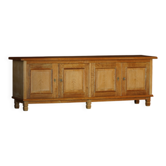 Modern Danish low enfilade in oak with panelled doors, mid-20th century.