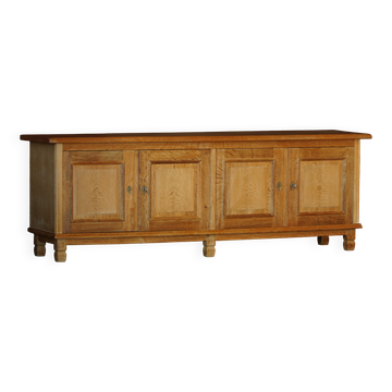 Modern Danish low enfilade in oak with panelled doors, mid-20th century.