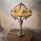 antique 19th century bronze rocaille lamp with a beautiful glass shade soldered with lead