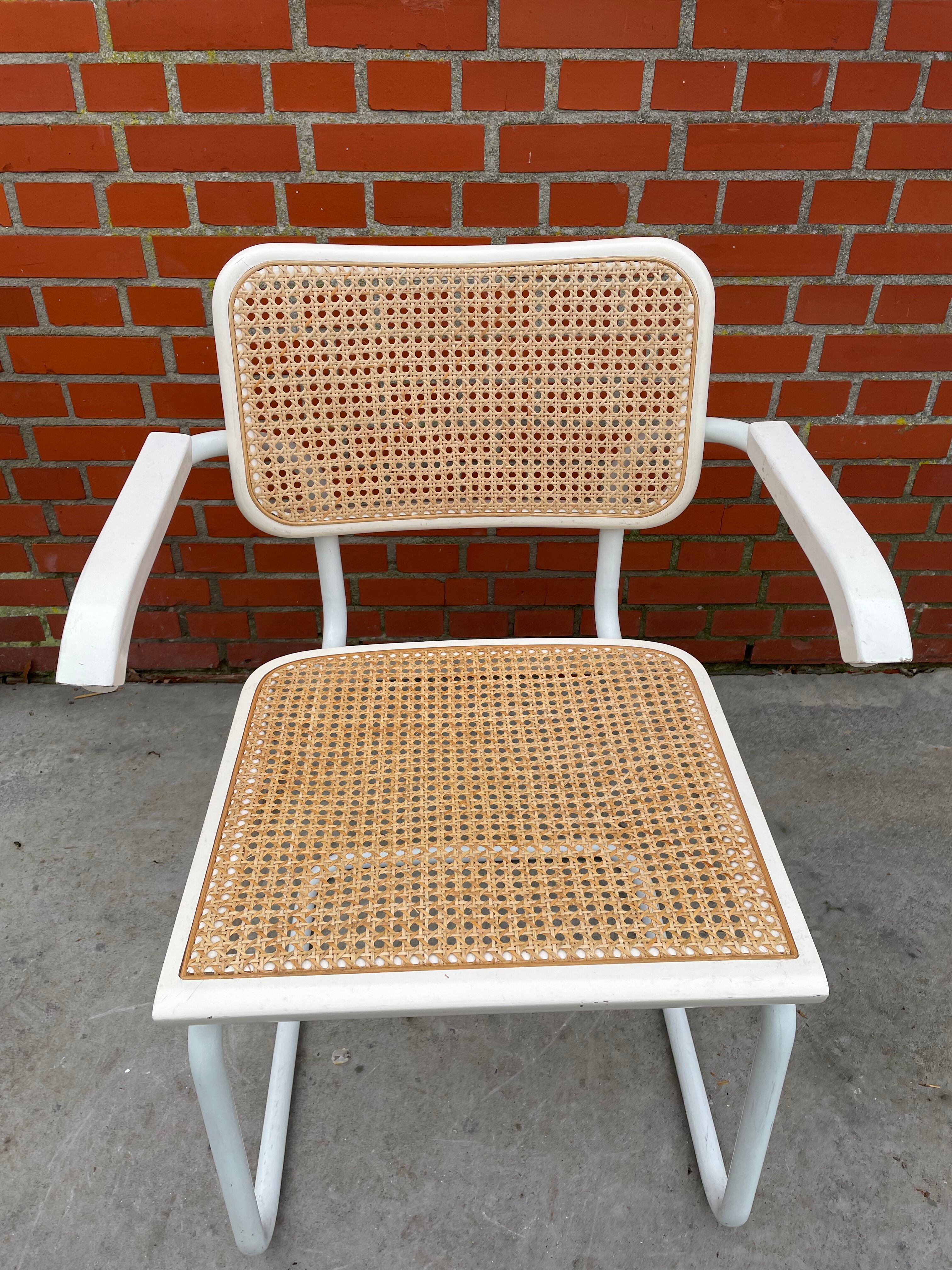 Cesca chair model with armrest in white