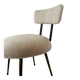 Low seat in metal and white boucle fabric.