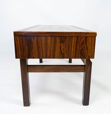 Low chest in rosewood and tiles, of danish design from the 1960s.