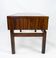 Low chest in rosewood and tiles, of danish design from the 1960s.