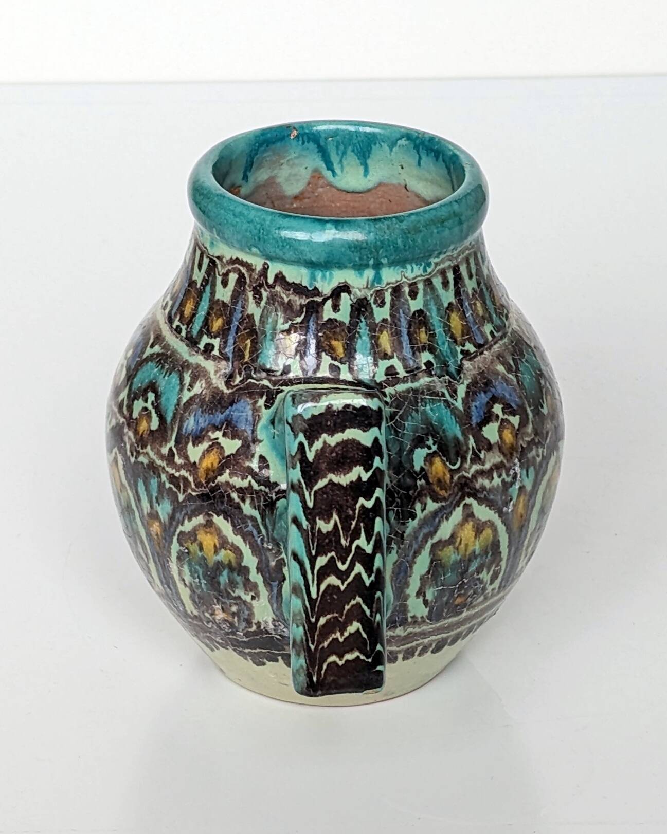 Polychrome ceramic vase in flowing enamel from Nabeul with mihrab decoration.