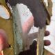 Italian mirror in gilded wood with gold leaf from the 18th century.