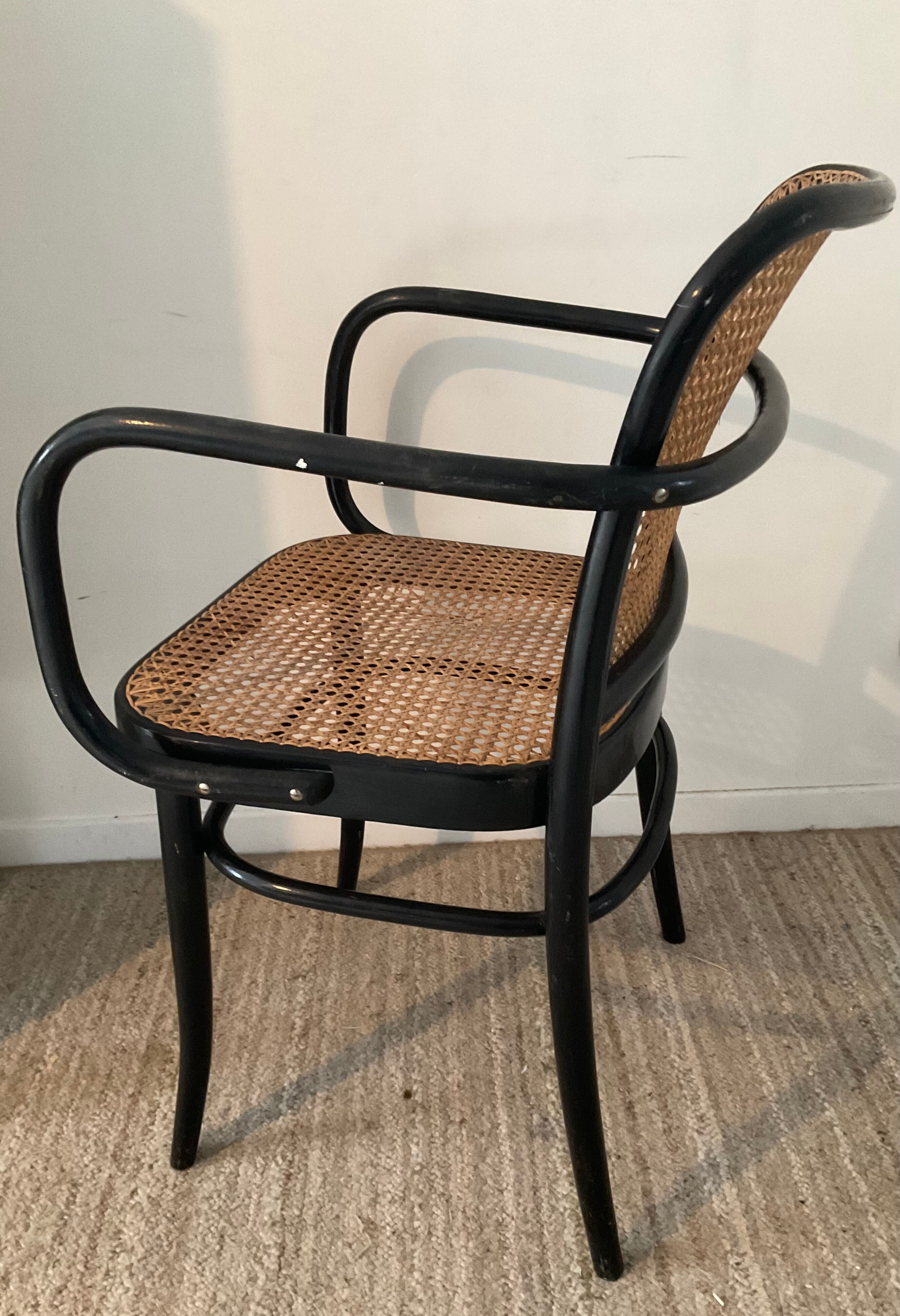 Canned bistro armchair and curved wood from the 60s