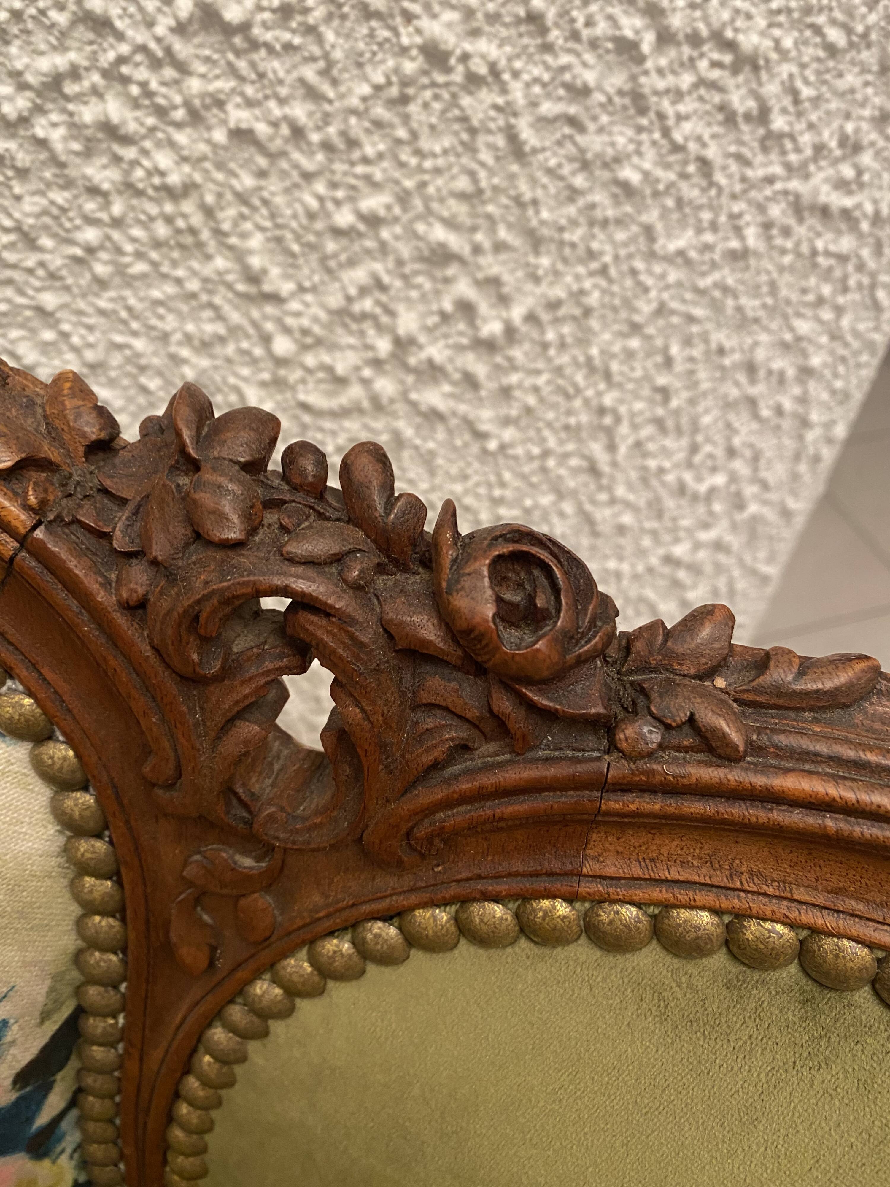 Paire de fauteuils en bois sculpté, XXème s.