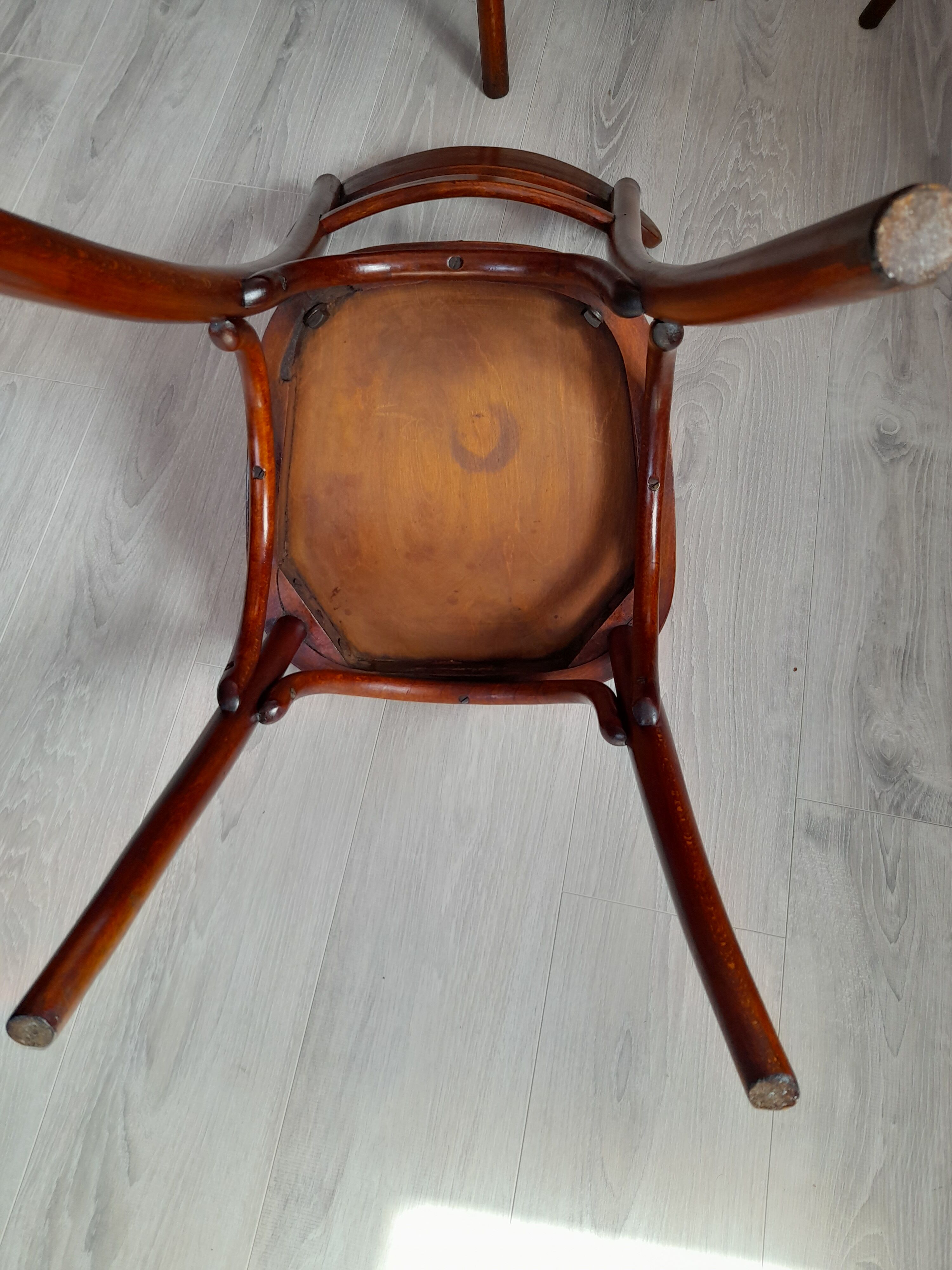 Suite of 4 bistro chairs, published by fischel