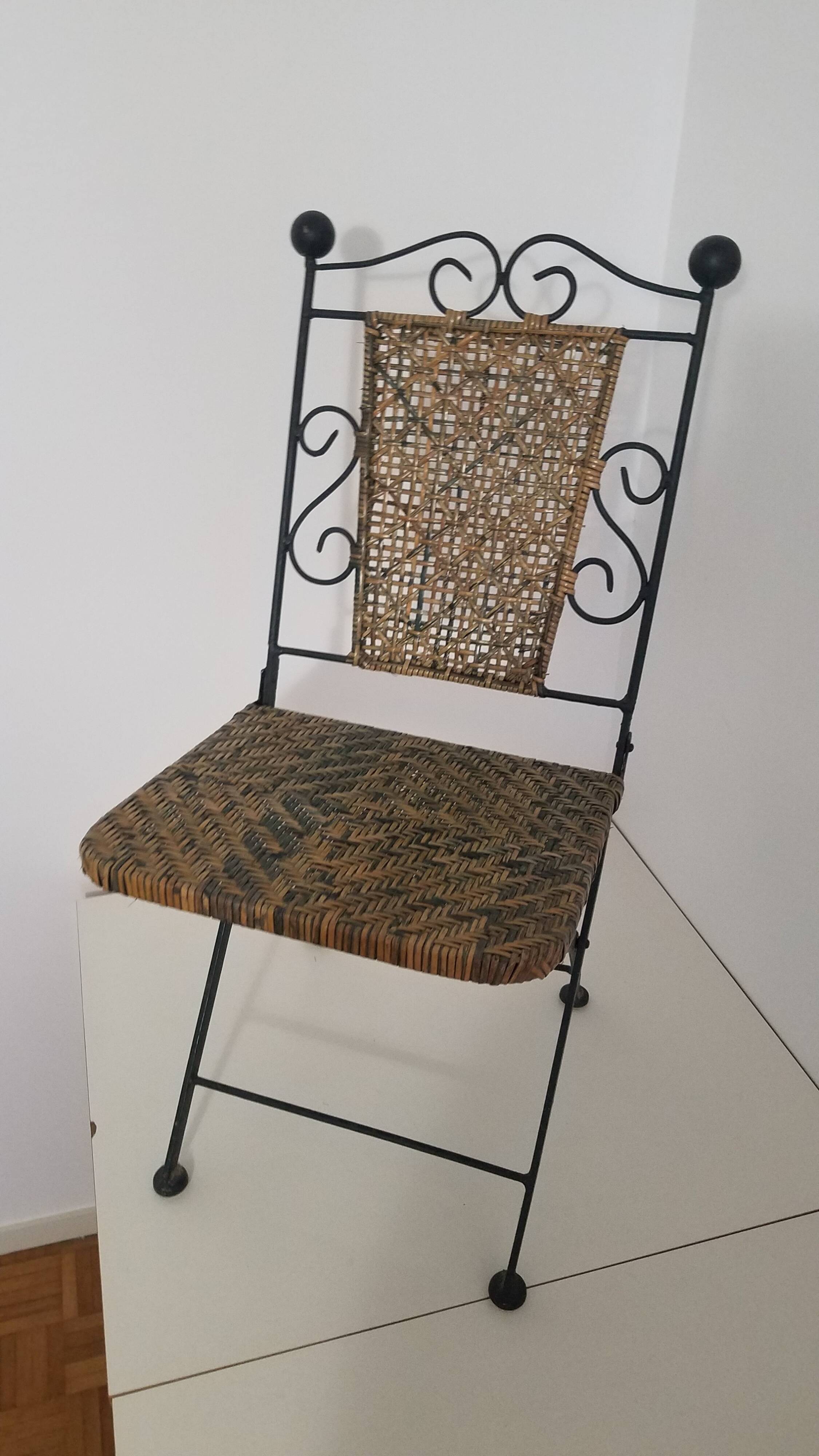 Chaise en fer forgé et rotin,  pliante  et vintage