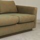 Pierre Frey modernist bench in green and gold patterned fabric
