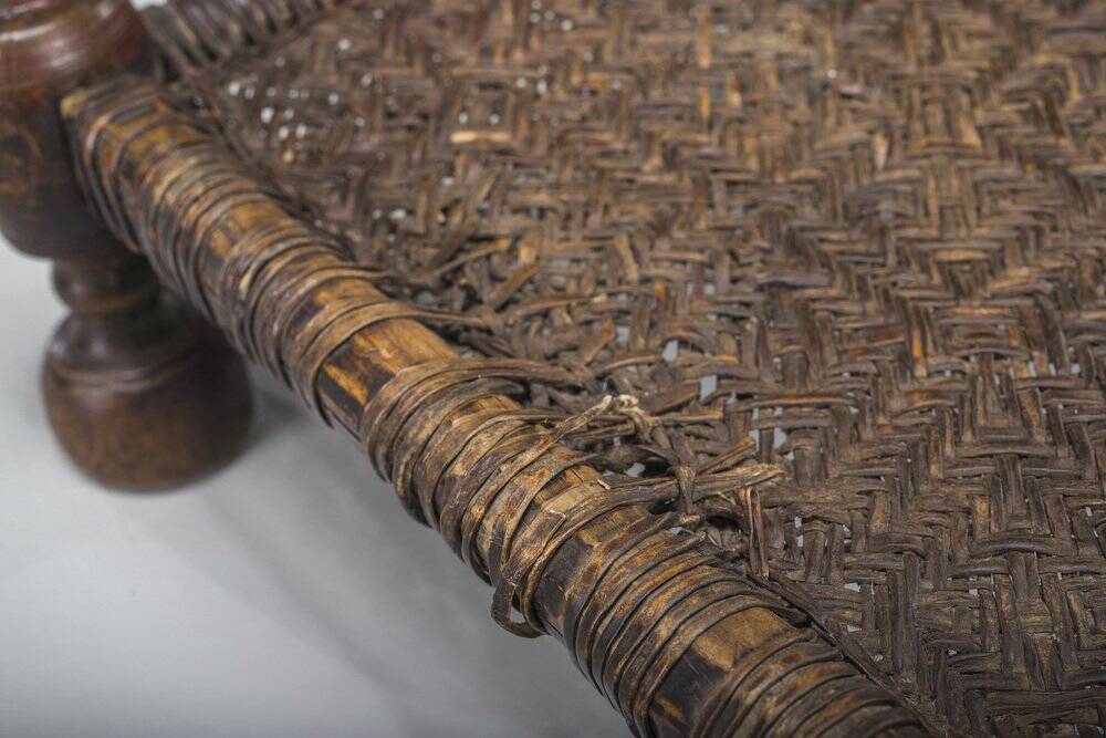 Early 20th century handmade low cedar chair, Nuristan, 1890s